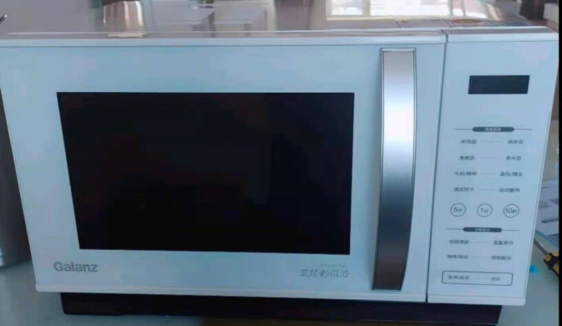 格兰仕变频微波炉家用光波烧烤炉里面是不是不锈钢的？