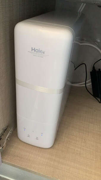 海尔（Haier）京东小家智能生态 家用净水器云净800G双出水直饮机 2.5升用净水的时候，那个水龙头，显示是原水还是纯水？