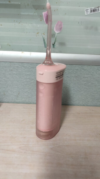 素士冲牙器筒式收纳便携洗牙器洁牙机水牙线W1樱花粉可以放其他品牌的瓶装漱口水吗？