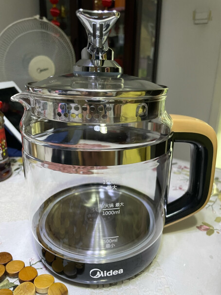 美的养生壶养生杯煮茶壶多功能电水壶烧水壶电热水壶配的茶漏是怎么装？