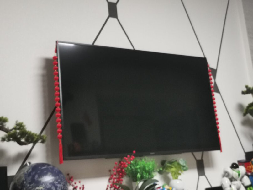 米的mediy25-55英寸电视挂架电视架创维65寸的能用吗？