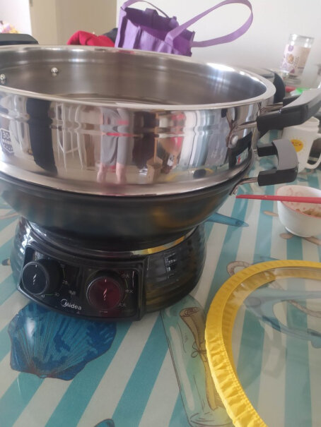 美的多用途锅电蒸锅、是304不锈钢的吗？