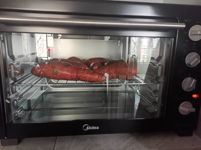 美的电烤箱Midea40L烘焙搪瓷大容量家用多功能有买这个PT4912W二代的吗？用起来好用吗？特别那个空气炸好用吗？