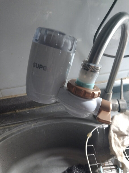 苏泊尔净水器水龙头滤芯请问买过的亲，用这款过滤以后的自来水喝起来怎么样？