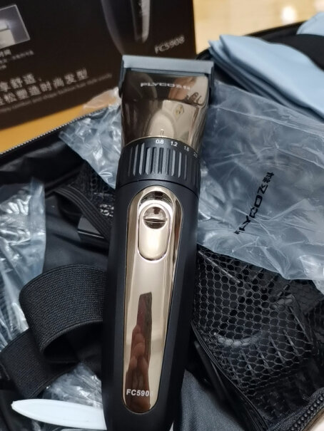 飞科智能电动理发器FC5820专业成人儿童家用电推子怎么打薄头发？用什么按钮？