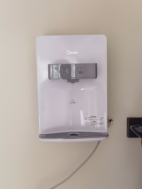 美的壁挂式管线机MG907-R家用温热型饮水机饮水器温热型上水声音大吗？
