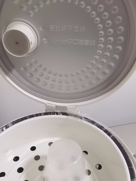 美的电饭煲4L机械式家用电饭锅锅盖盖上煮粥会溢吗？
