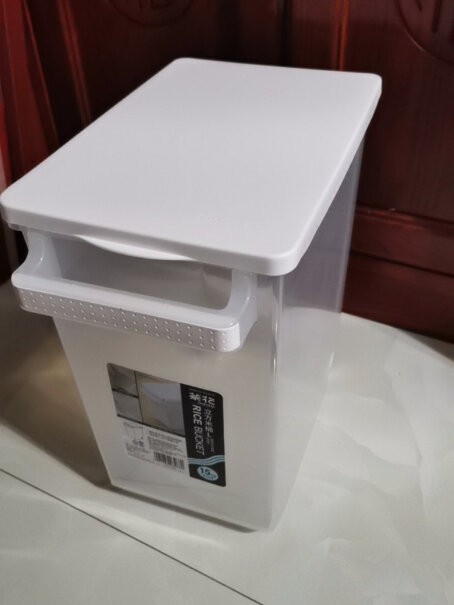 厨房储物器皿茶花立方米桶密封30斤大号米面桶塑料储米箱带滑轮杂粮收纳箱使用感受,质量真的差吗？