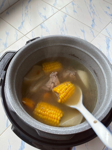 美菱电压力锅智能预约家用电饭锅高压快煮蒸煮粥大容量多功能锅想问下买过的亲 这个锅煮饭灰糊吗？粘不粘锅，推荐购买吗？