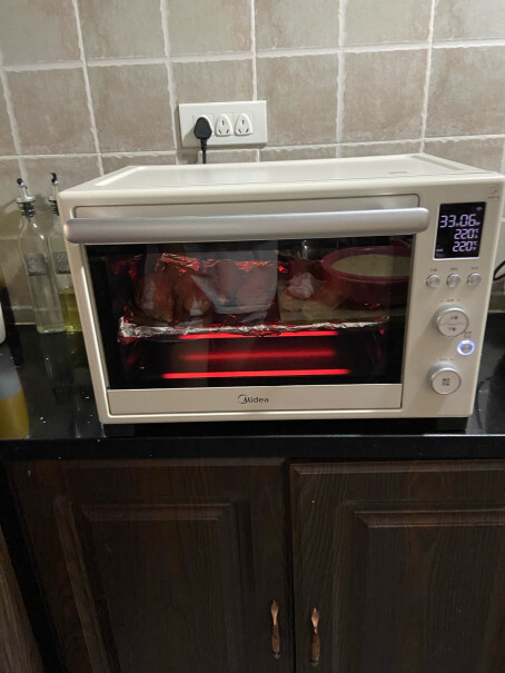 家用多功能电烤箱35升大容量搪瓷内胆智能家电PT3530W怎么样，东西会不会容易糊啊？