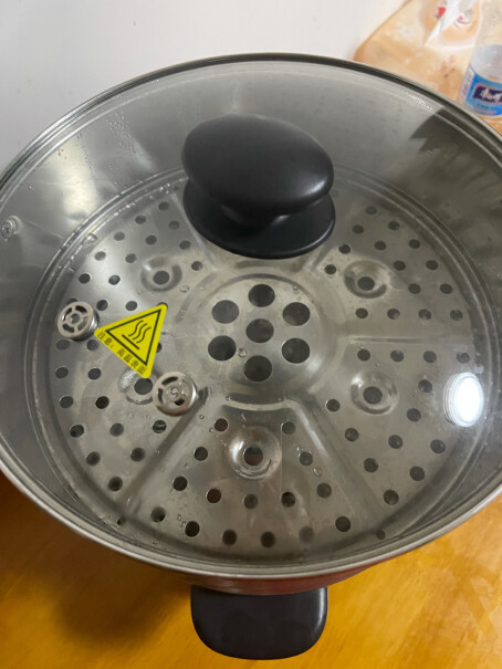 美的多用途锅电蒸锅这个锅是不3O4不绣钢吗？