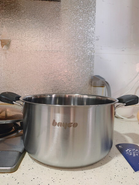拜格不锈钢汤锅加厚24cm请问这款锅在天燃气灶上用会不会发黑呢？