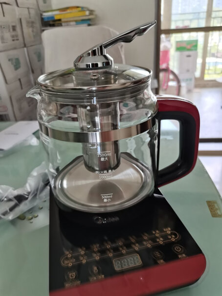 美的养生壶电水壶1.5L多功能烧水壶煮茶器壶是整体玻璃的吗？