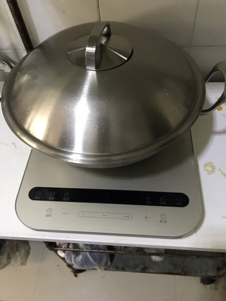 美的电磁炉滑控调节送的锅可以用吗？是不是容易生锈？