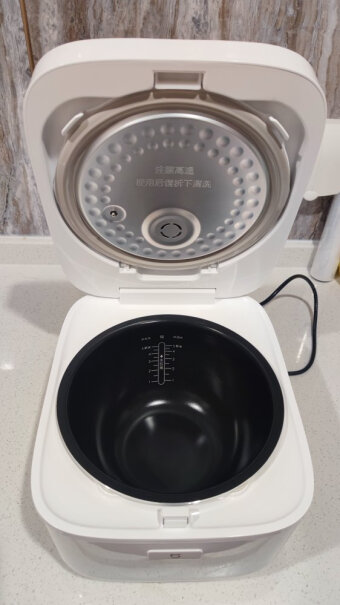 米家小米电饭煲电饭锅煮饭键向下按，你们的电饭煲会产生因为有缝隙产生的声音么？