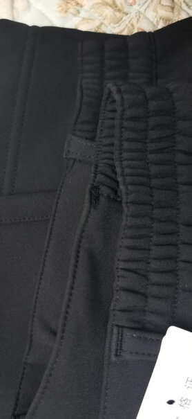 探拓户外冲锋裤男款PW76091.74，73公斤，里边套保暖裤，该买多少号的？？喜欢宽松的？