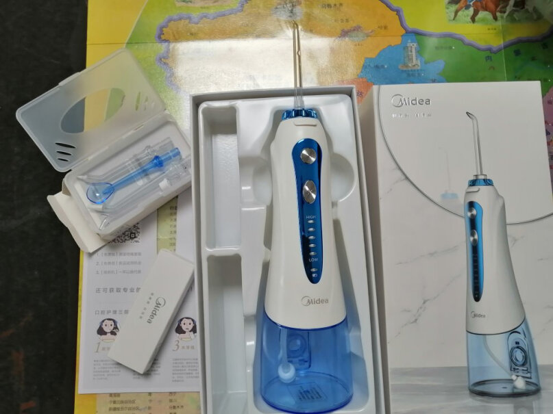 冲牙器美的小蓝鲸电动冲牙器便携式洗牙器水牙线洁牙器家用60天续航使用两个月反馈！网友诚实不欺人！