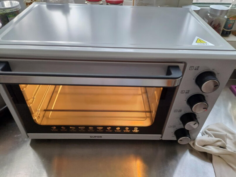 苏泊尔家用多功能电烤箱定时控温功能键怎么不亮？