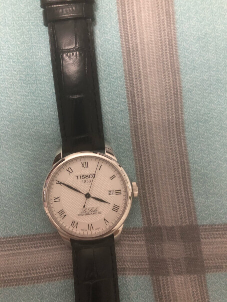 天梭TISSOT瑞士手表力洛克系列正不正品不知道 别人问还说是正品？