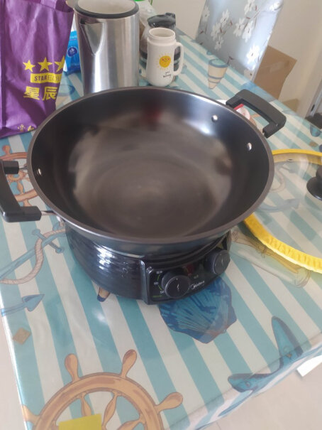 美的多用途锅电蒸锅、是304不锈钢的吗？
