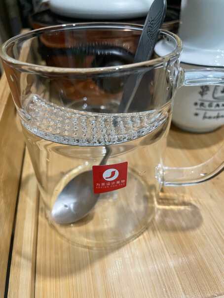 雅集玻璃杯带过滤耐热泡茶杯子麻烦问一下，这款木底杯子能加热么？