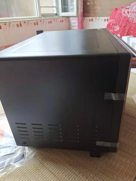 苏泊尔家用多功能电烤箱35升大容量请问用过的朋友们，这款烤箱上面可以同时放电饭煲或者微波炉吗？会不会被烫坏？