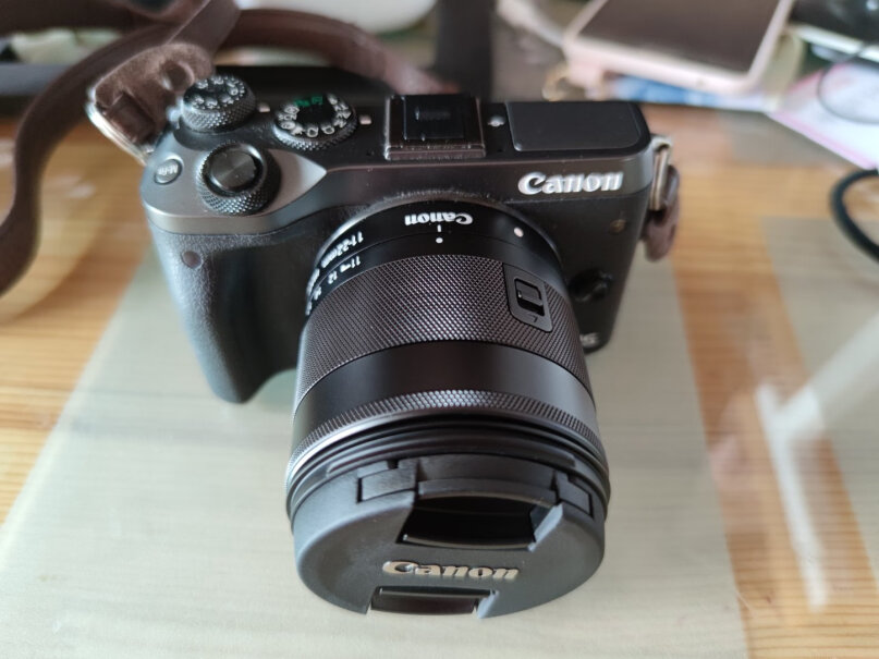 佳能EF-M 32mm定焦镜头请问这款与套机的15-45镜头相比，哪个广角画面更广一些？