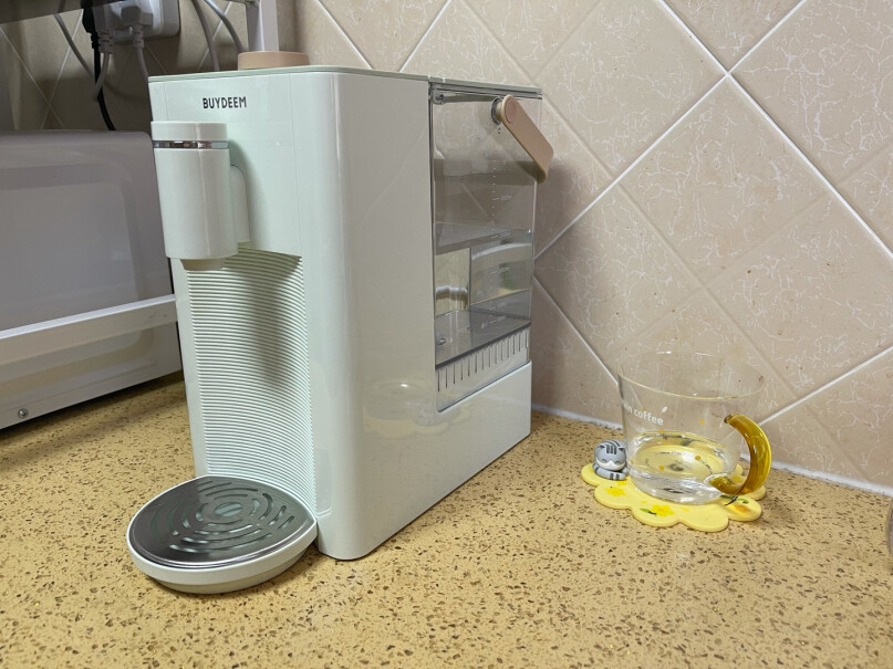 北鼎即热式饮水机即时加热小型迷你茶吧机饮水器用久了进水口的小孔里会长黑色的水藻一样的东西（我一直用的是矿泉水）用什么工具方便清洗？