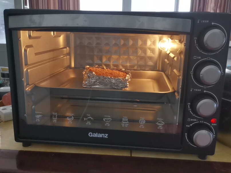 格兰仕电烤箱家用40L大容量三层烤位带防爆炉灯上下独立控温费电吗？