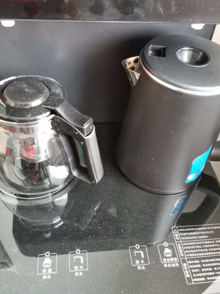 美菱立式温热型饮水机多功能智能茶吧机高端旗舰温热款两边侧板是什么材质？