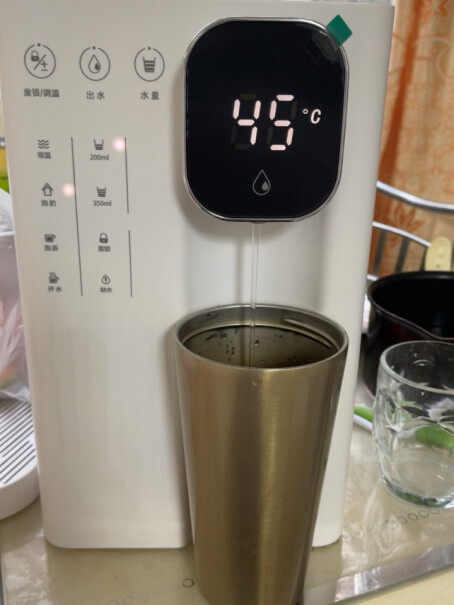 集米T2即热饮水机即热式饮水机装水的水箱是玻璃还是塑料的？