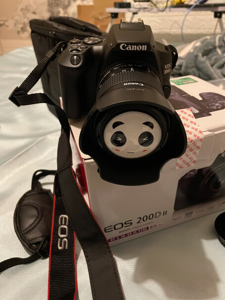 佳能EOS 200D II单反相机想问一下，礼包版的就有哪些啊，比套餐一少什么嘛，谢谢？