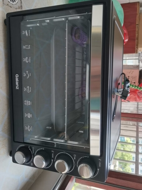 格兰仕（Galanz电烤箱这个外箱温度高不高，大概是多少。