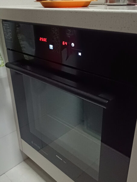 老板R075嵌入式电烤箱家用60L大容量内嵌式多功能烘焙烤箱蒸包子馒头能蒸两层吗？