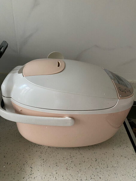 美的智能电饭煲家用煮好粥打开盖有很多烝气水排出没东西装的吗？