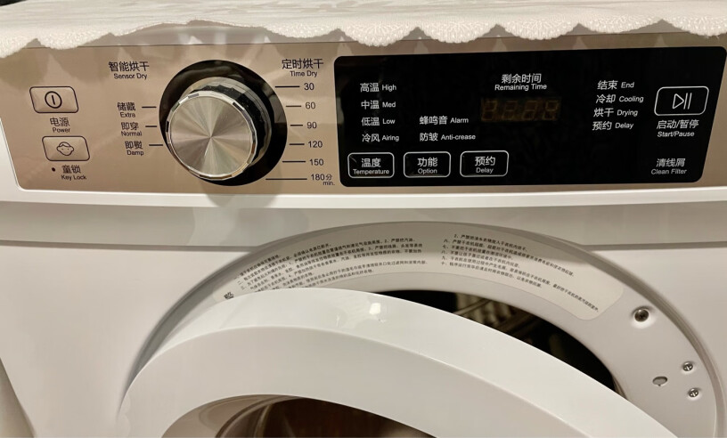 海尔冷凝烘干机家用干衣机除菌家用9KG滚筒式被子除霉味是这种直排的好用，还是买热泵的？