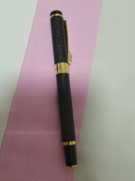 英雄钢笔黑绒砂铱金钢笔美工笔明尖6006吸了水能退吗？