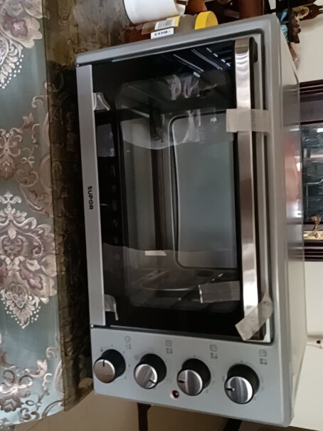 苏泊尔电烤箱家用烘焙蛋糕30升全自动烤箱电烤炉材质怎么样？