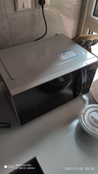 美的变频微波炉家用微烤一体机问下你们炉子工作时有滋滋电流声么？