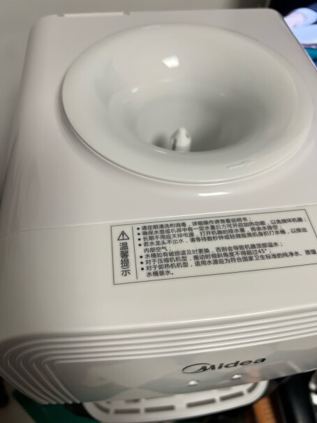 美的饮水机家用办公桌面小型台式温热饮水器YR1220T有带净水器的么？