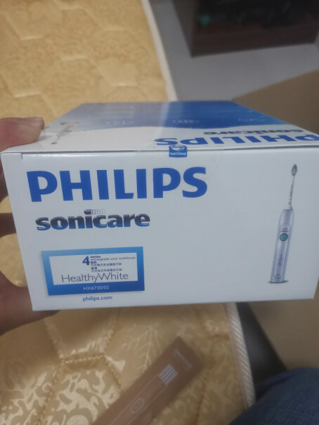 飞利浦sonicare电动牙刷礼盒刷牙的时候中间会自动停止一次，是什么原因？