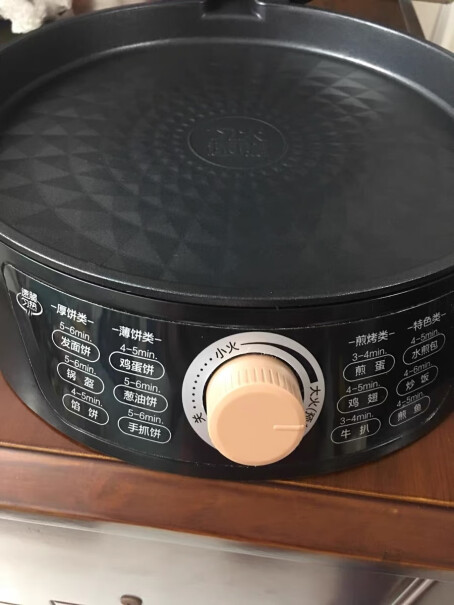 美的电饼铛家用双面加热电饼档烤盘可以拿出来洗吗？