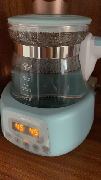 美的婴儿恒温水壶调奶器热奶器1.2L你们用矿泉水煮还是自来水煮啊？