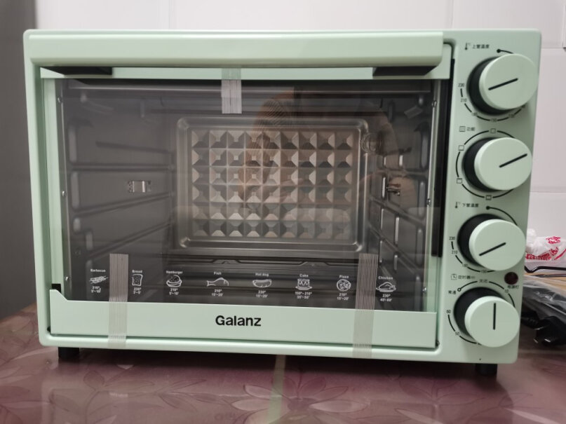格兰仕（Galanz多功能电烤箱麻烦问一下质量可以吗？有手套之类的礼品吗？