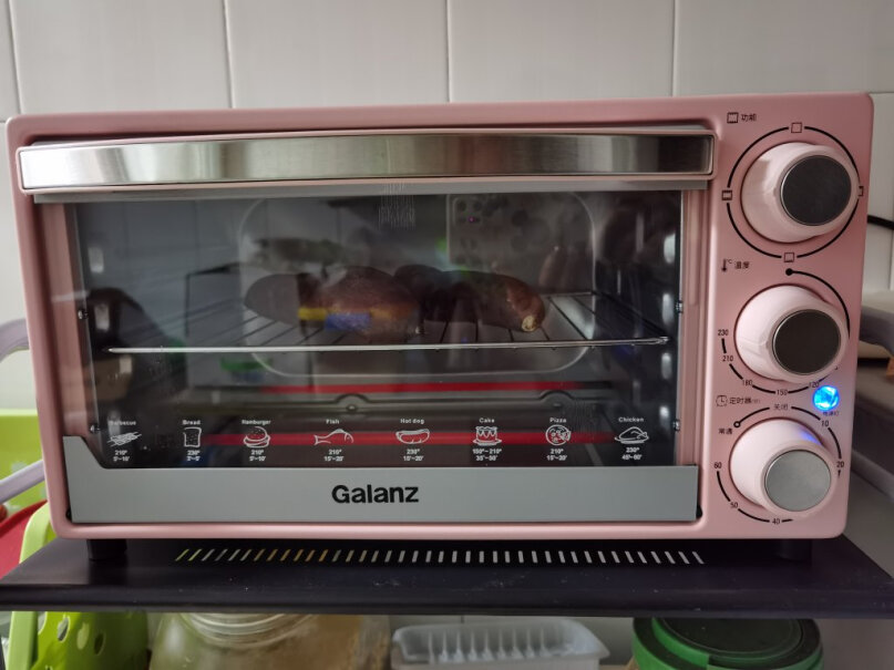 格兰仕Galanz电烤箱家用多功能迷你烤箱21升小巧容量烤箱底部不能打开接渣盘也不能拿出来，这样清理的干净吗？