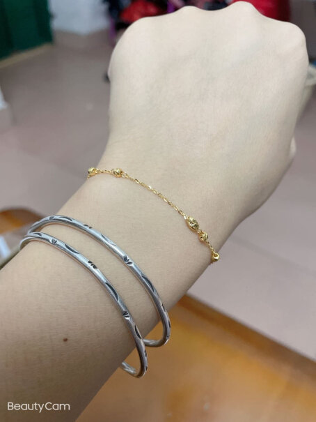 周六福珠宝黄18K金手链女款时尚转运小花珠彩金手链是真金吗？