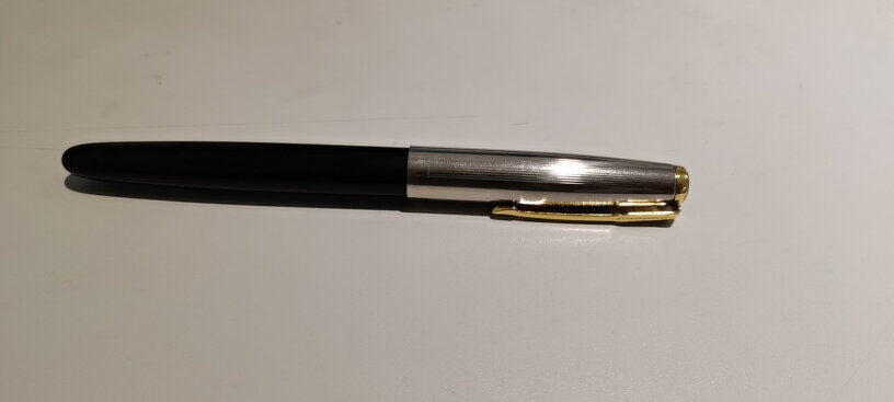 英雄钢笔616升级款学生钢笔黑色墨囊怎么用，取下推墨再插进去吗？里面灌满墨了吗？