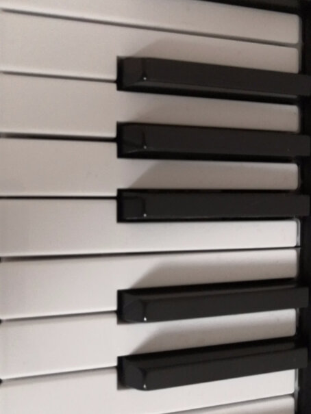新韵电子琴61键智能亮灯跟弹有没有琴架？