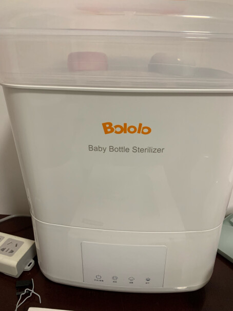 波咯咯奶瓶消毒器带烘干多功能婴儿消毒柜奶瓶消毒锅可保管你们买的开关有没有声音？一打开关就发出了哒哒哒的声音，好像从里面发出来的？