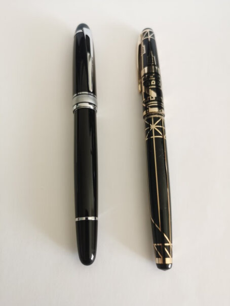 英雄钢笔100经典金尖钢笔商务办公墨水笔签字笔黑色银夹第一次写，笔尖口水严重，不能写？
